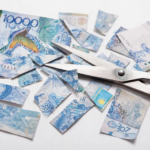 Разрезанная купюра 10 000 тенге